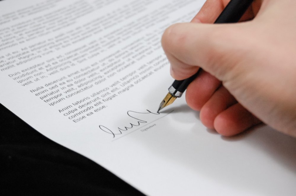 Signing a contract document