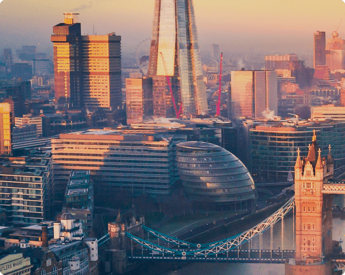 image of London skyline in the sunset heading an about us section - EM Law - Commercial Lawyers in London