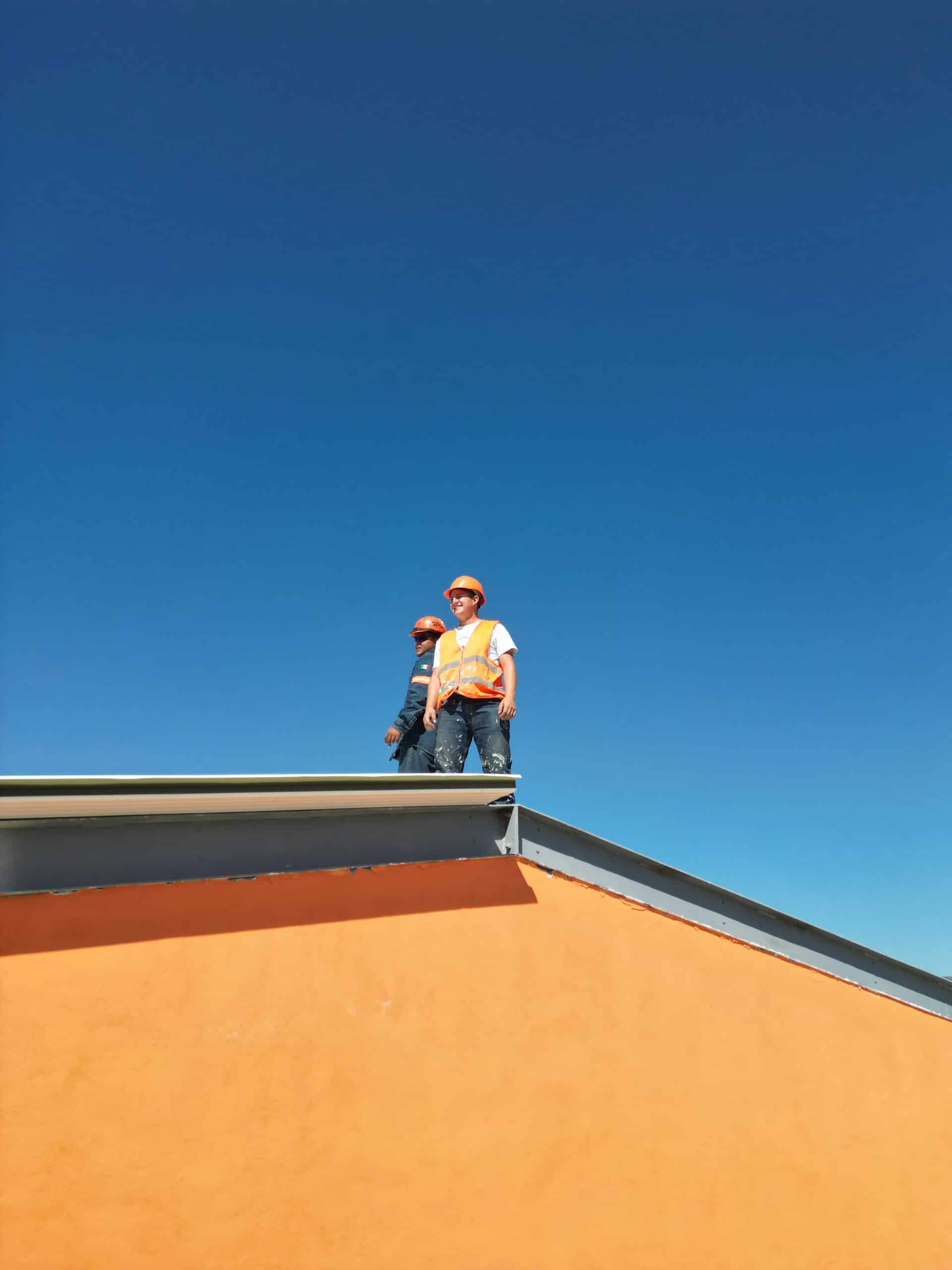 image of contractors on the roof