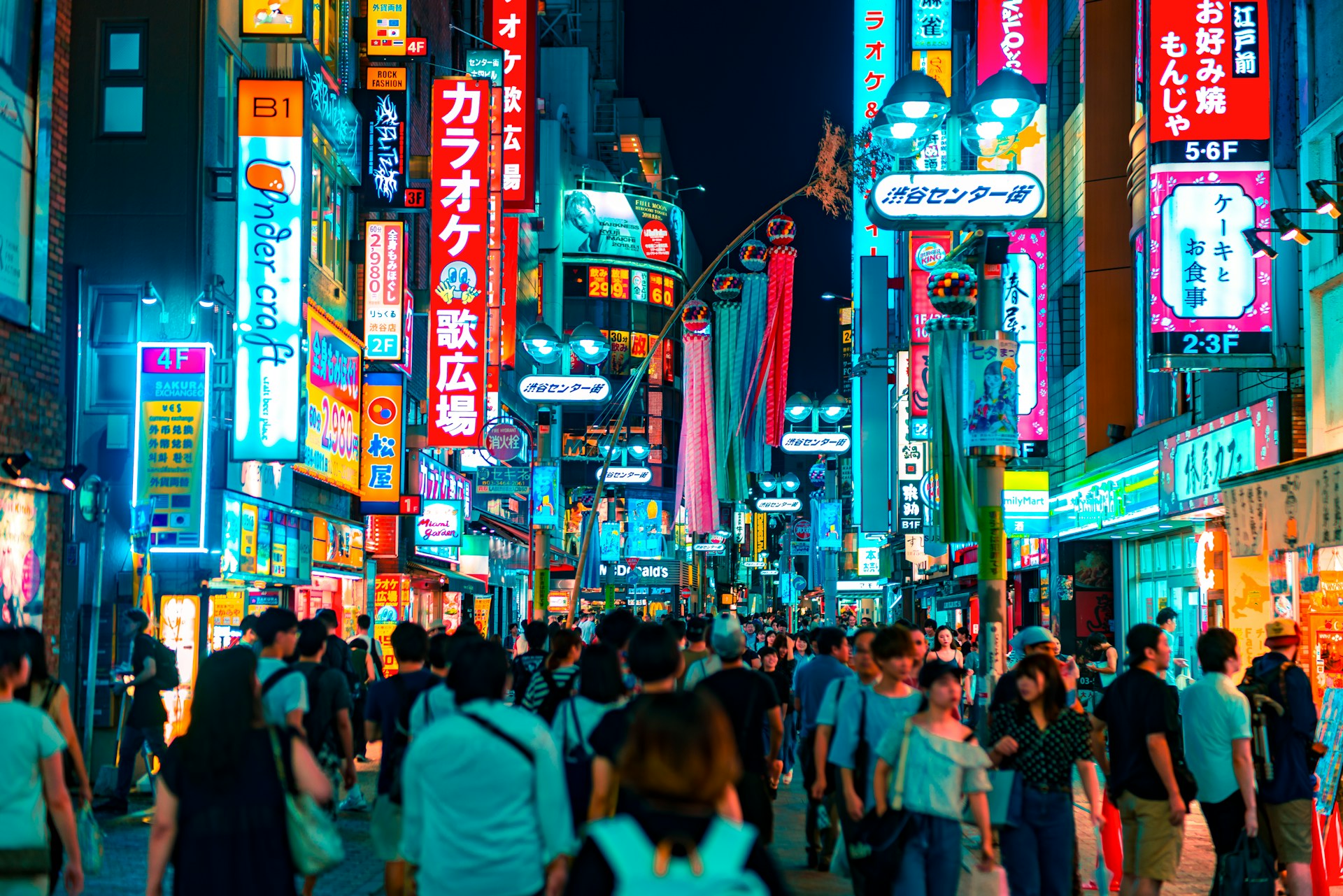 image of a busy street at night heading an article about subsidiary