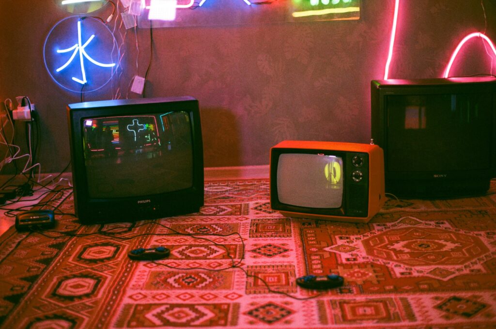 image of retro analog televisions in the middle of an article by EM Law about upcoming updates to consumer law following the Digital Markets, Competitions and Consumers Act 2024