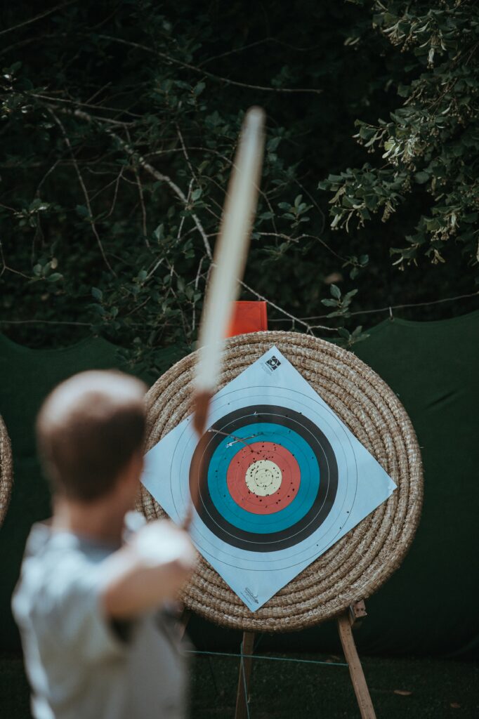 image of a man aiming at the archer's target being a part of EM Law article about Indemnity and talking about a need for precision when wording the indemnity contract 