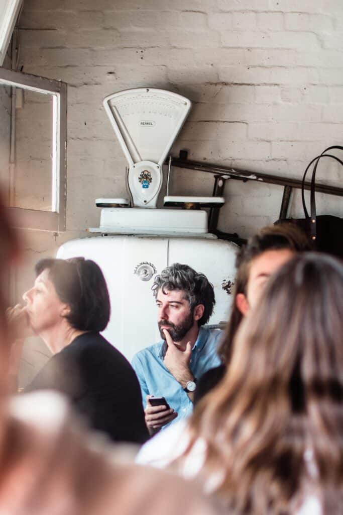 image of a thinking man in a cafe heading an article by EM Law about Novation 