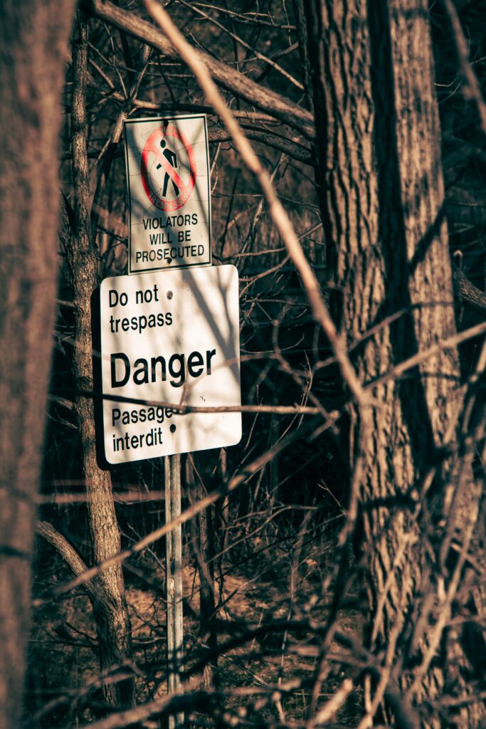 image of Danger no trespassing sign in the article about Tort Law by EM Law