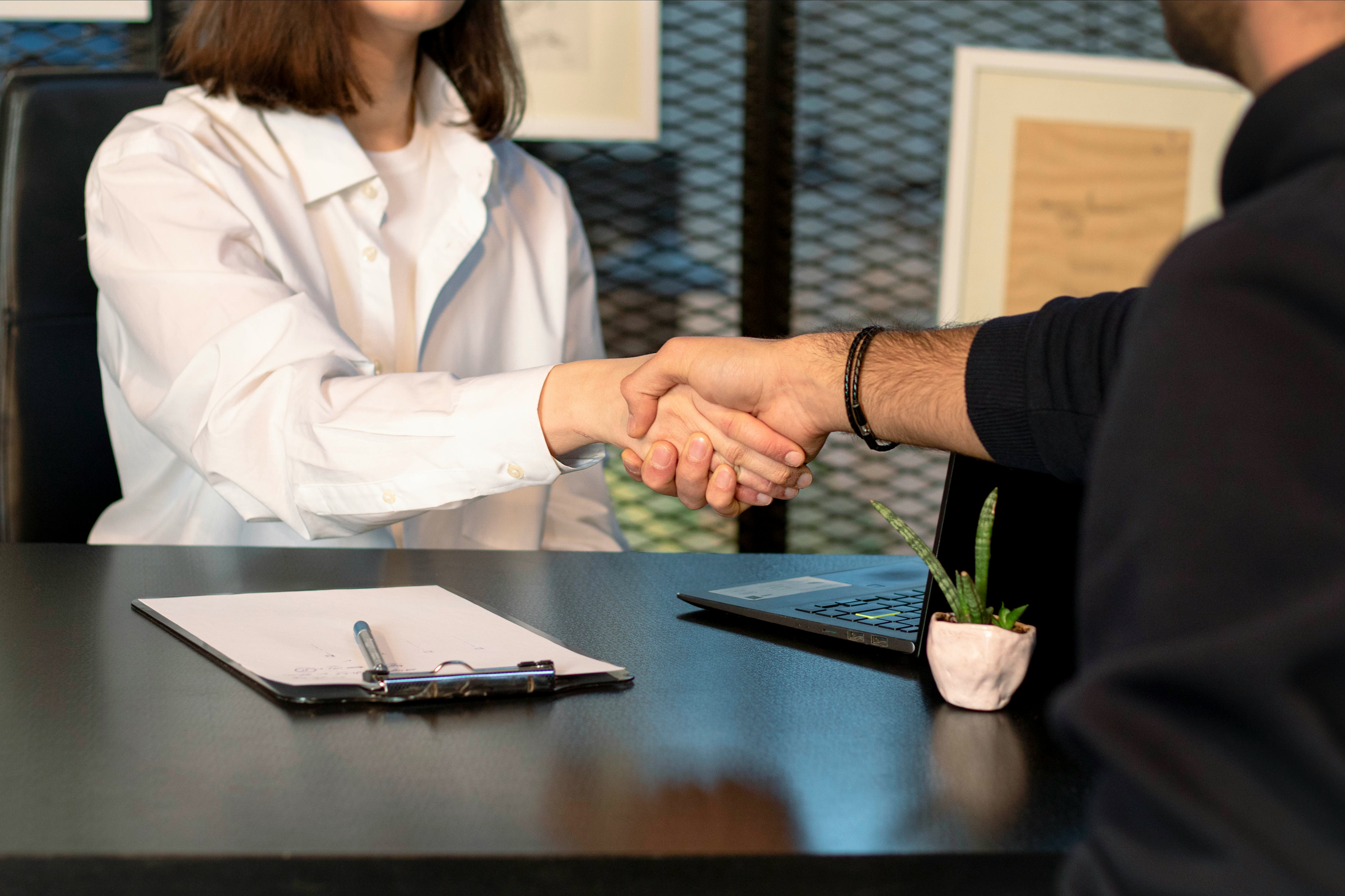 image of people shaking hands