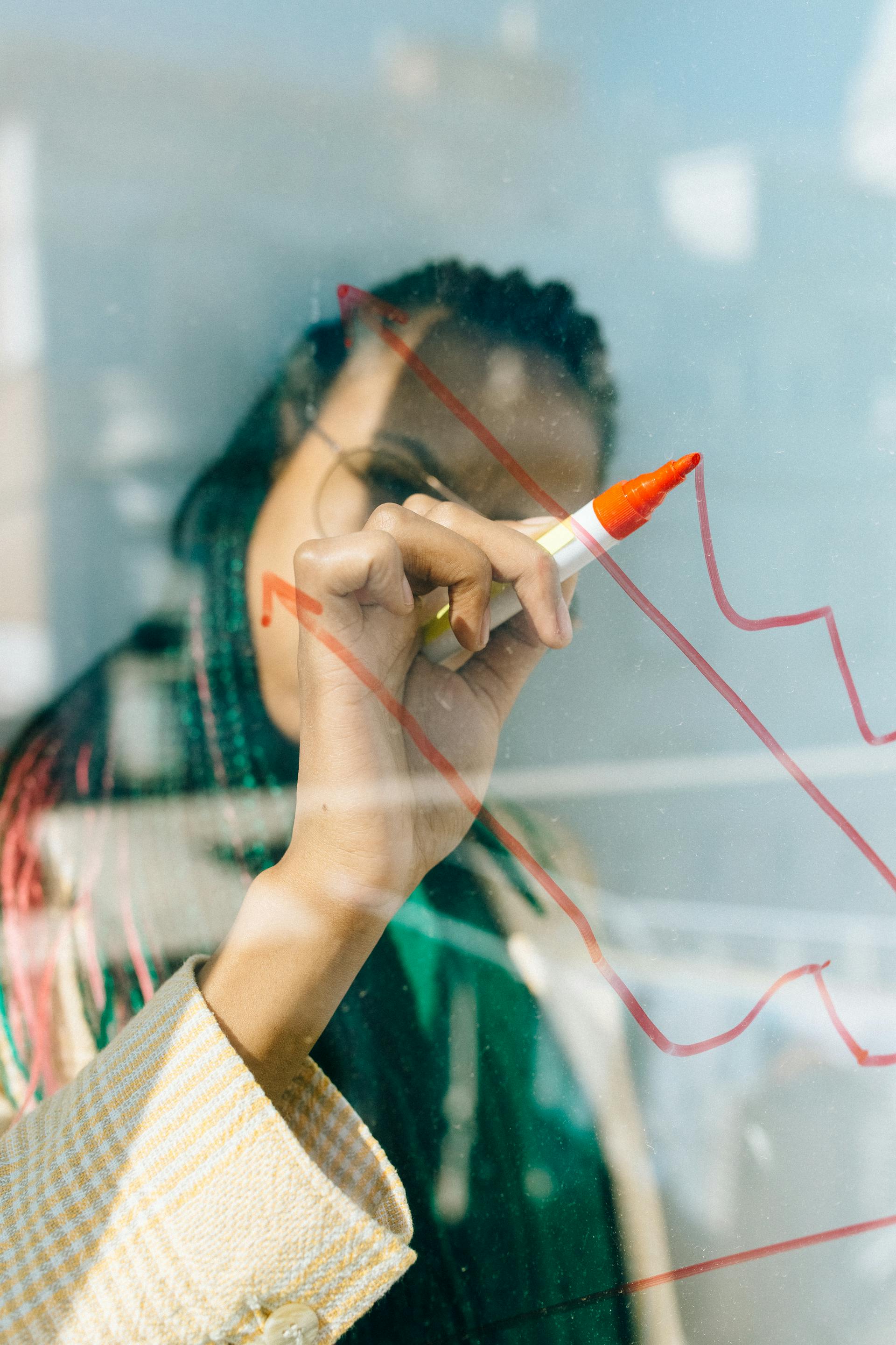 image of a woman drawing an upward going arrow heading an article by EM Law about new employment rights bill