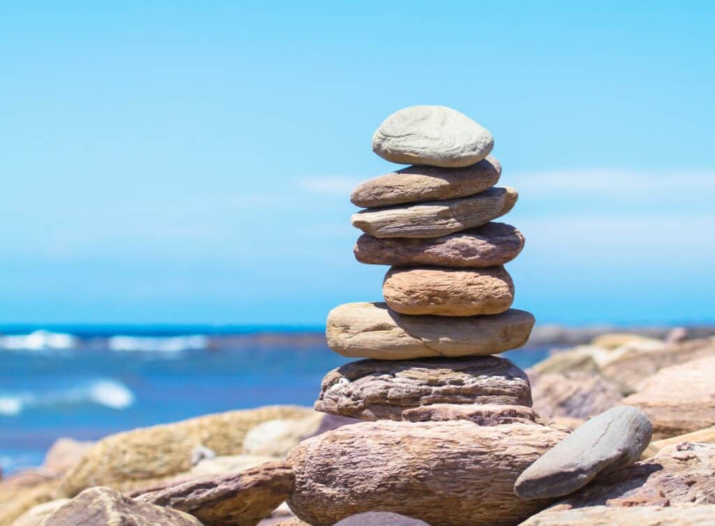 stack of stones image inside an article inside an article by EM Law about Ltip