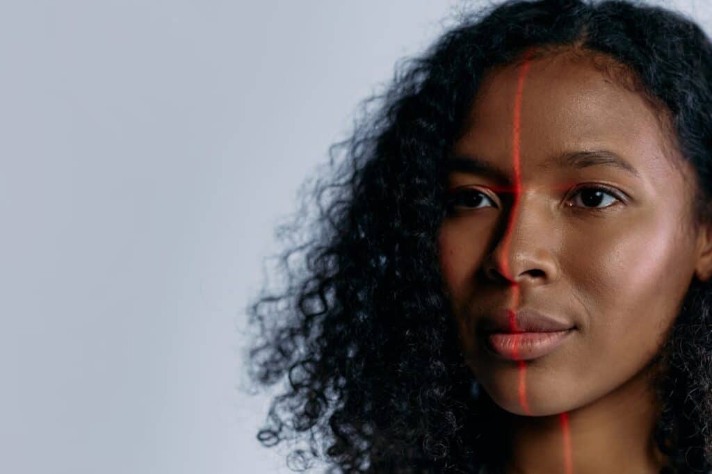 woman with a red scan going over her face