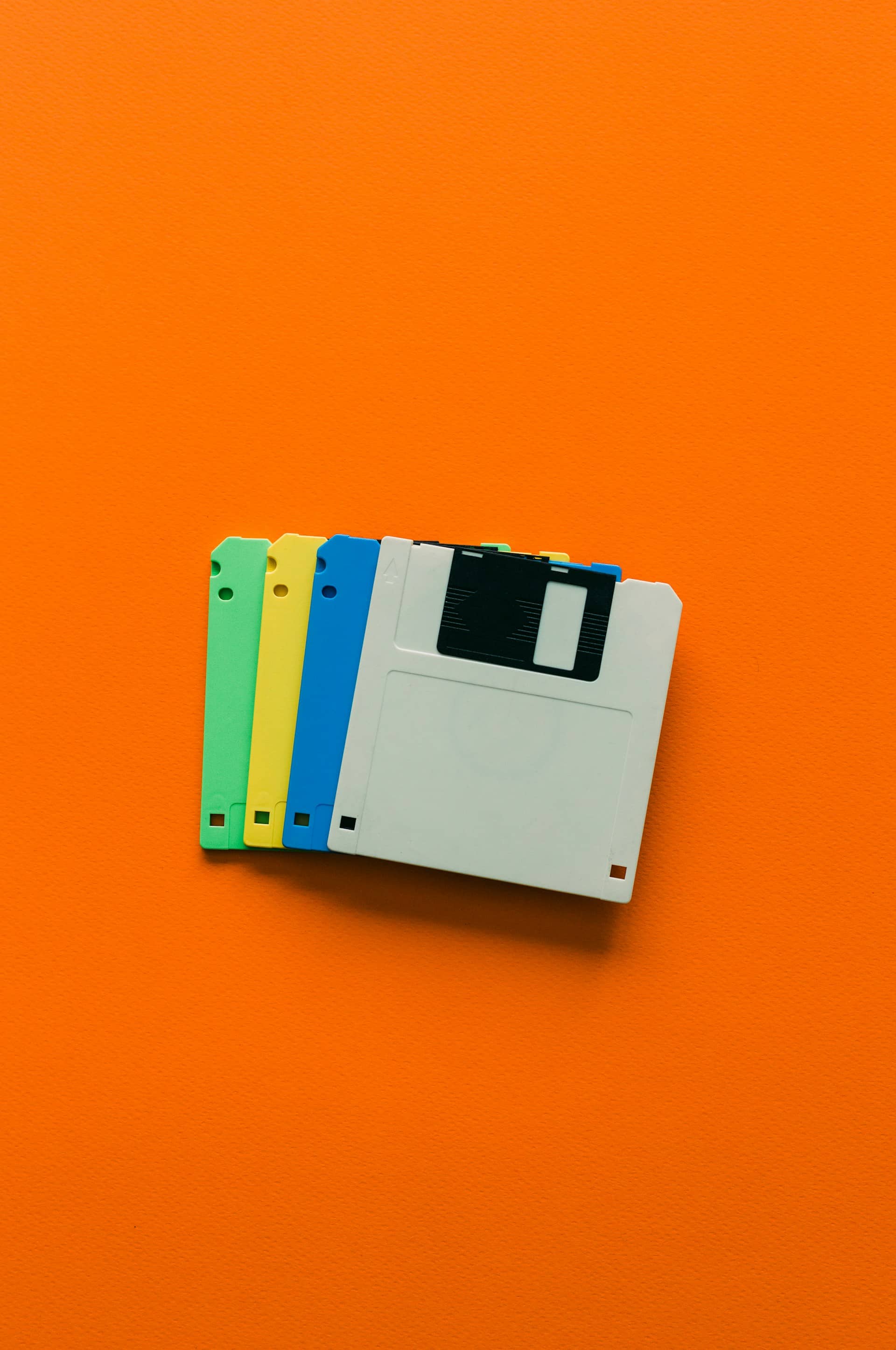 discs lying on orange background