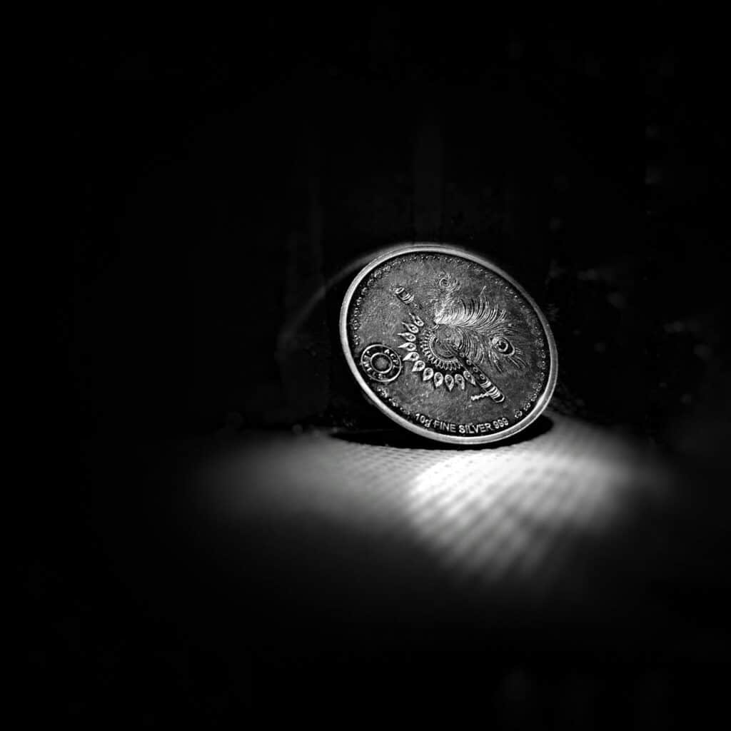 a coin with a reflection