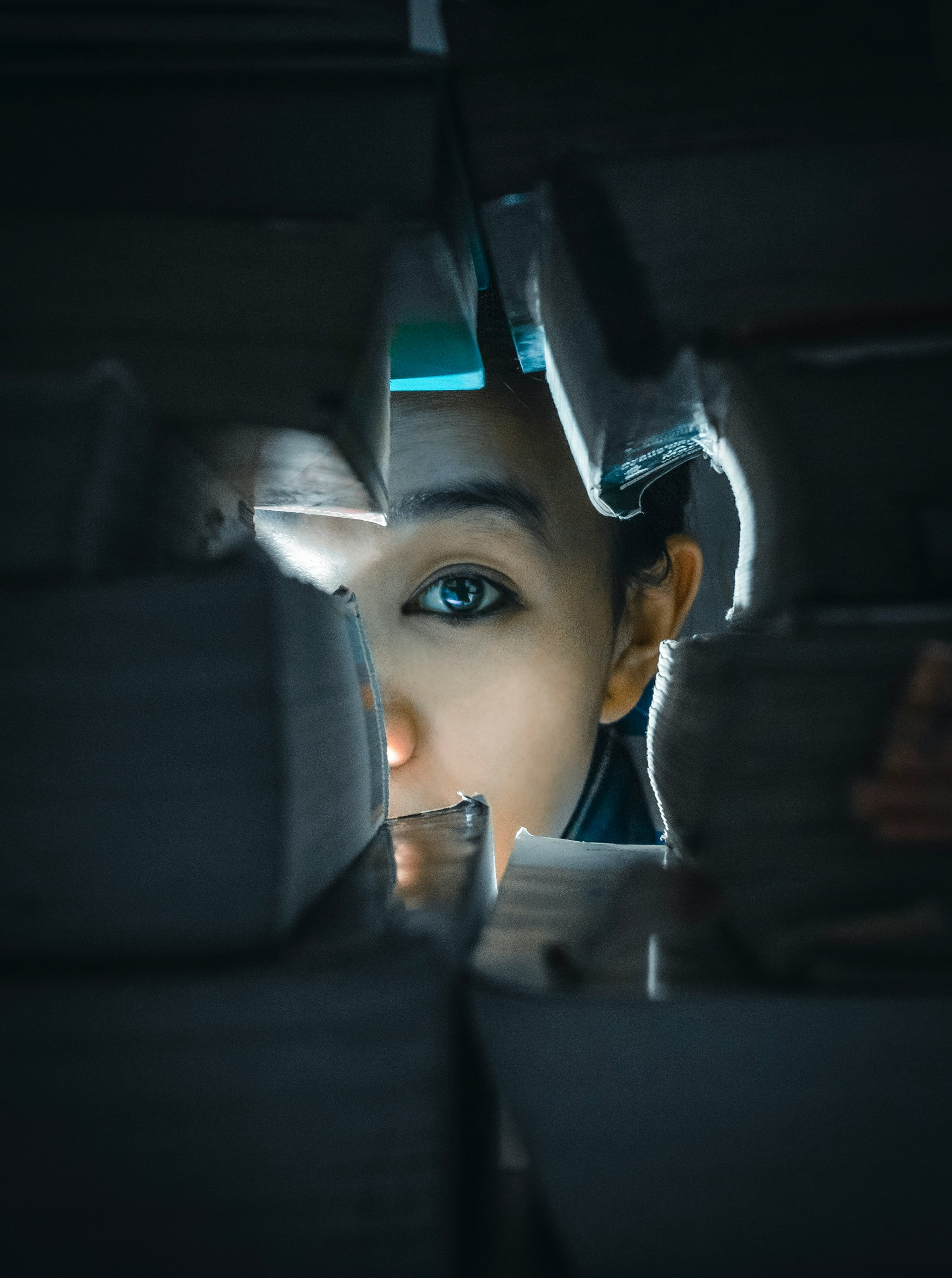 Image of face behind the wall