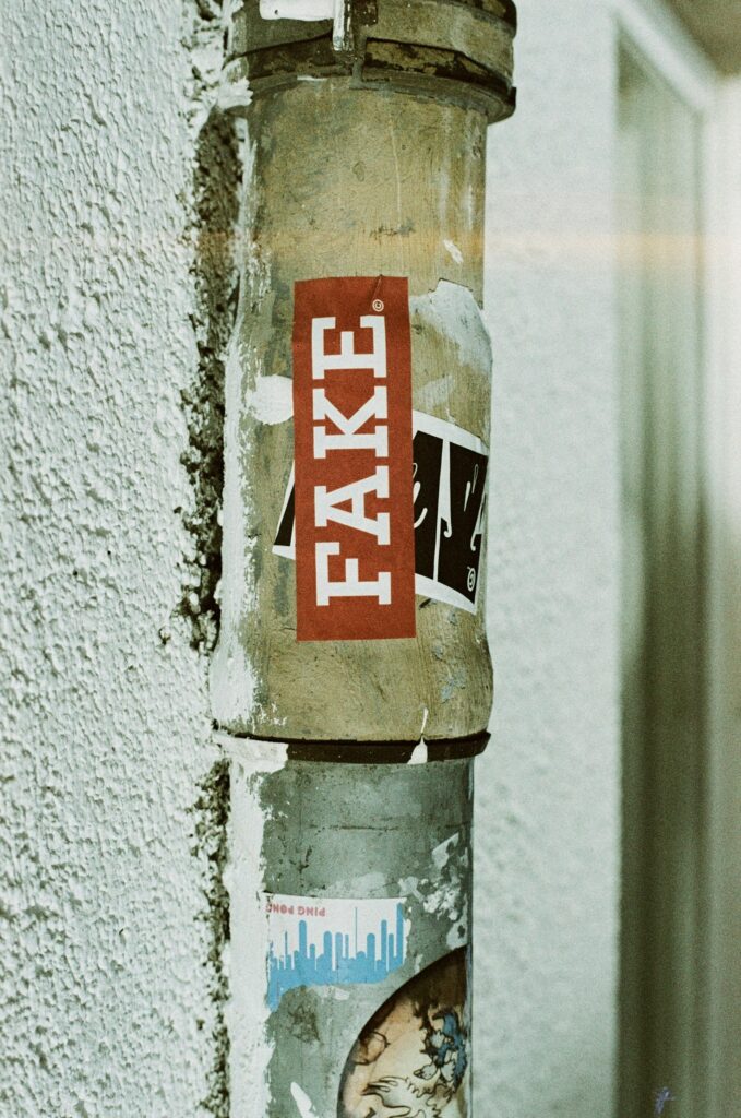 image of a sticker saying fake