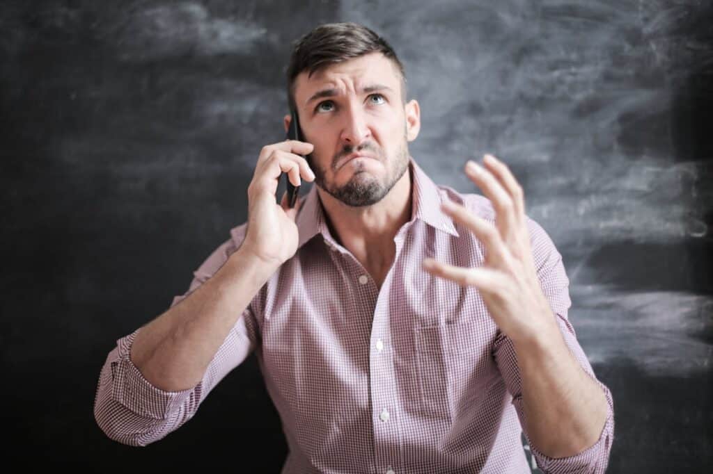 image of a complaining man