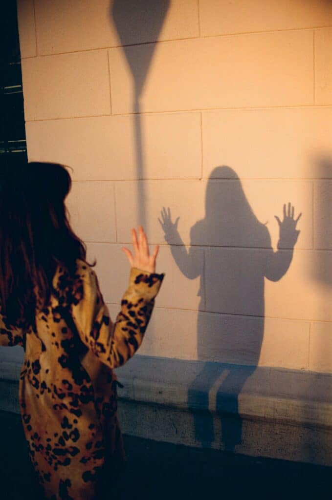 image of a woman playing with shadows