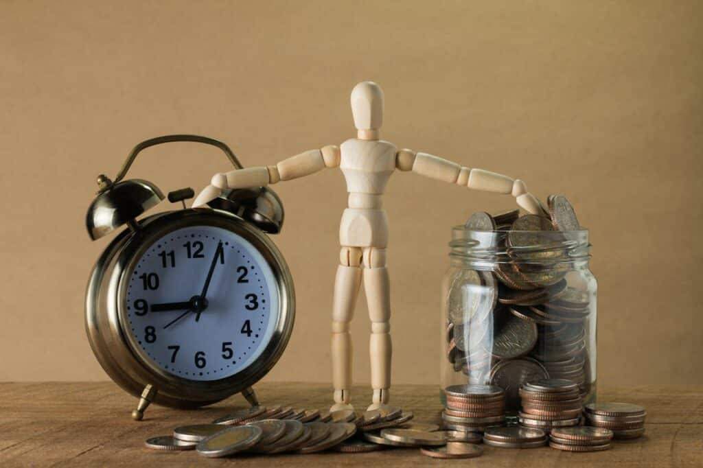 image of clock and money