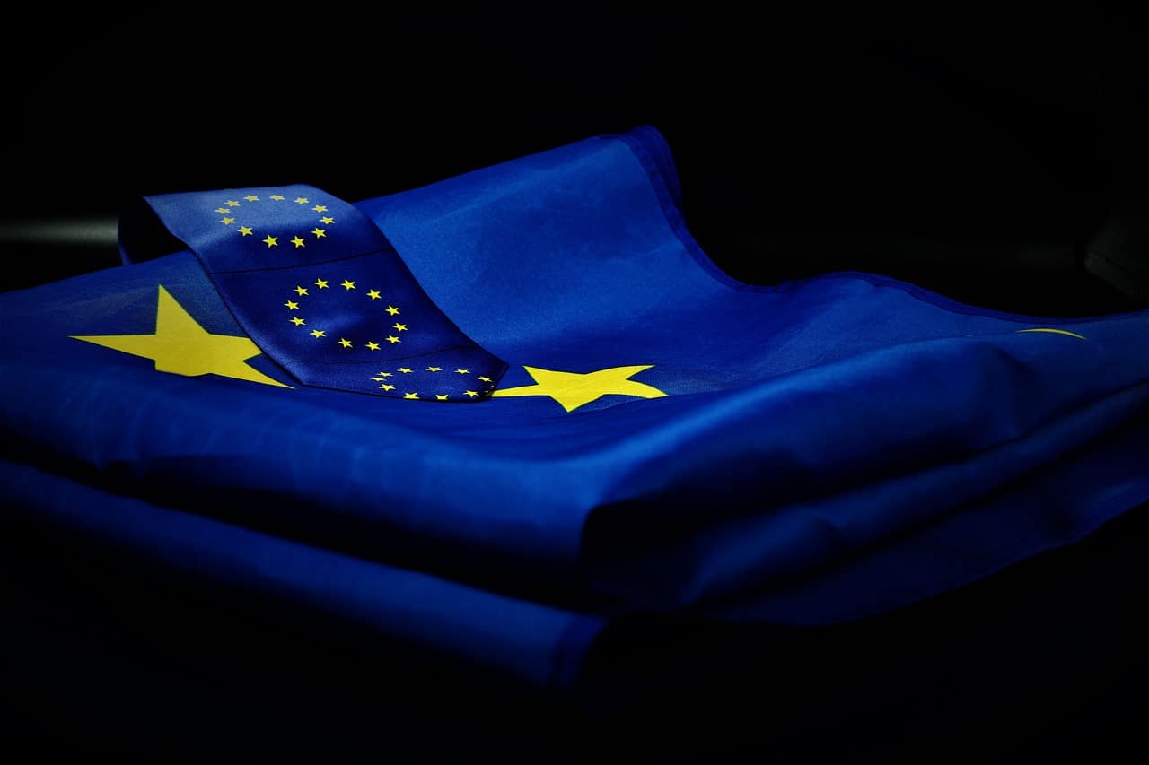 image of EU flag against black background in further reading section on EM Law blog about UK AI strategy