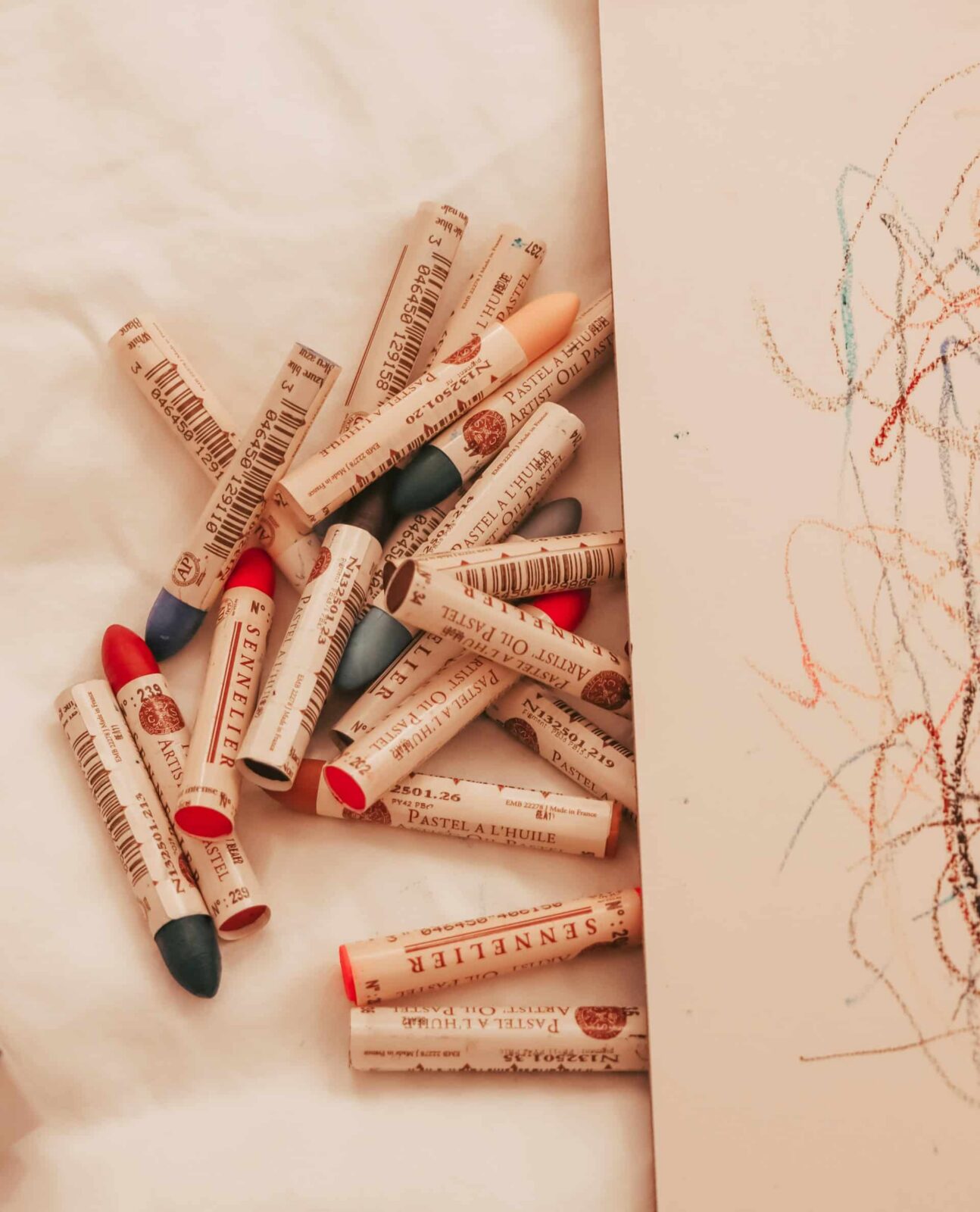 Crayons next to a messy image EM Law