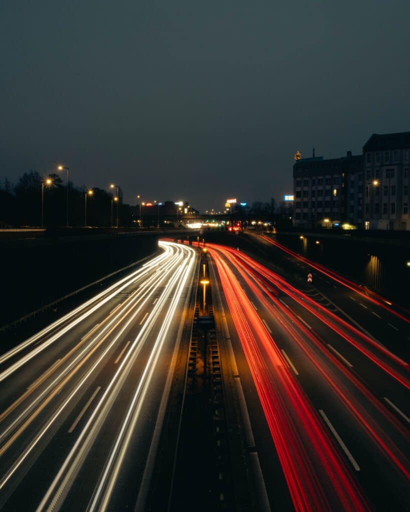 Image of cars on a motorway in an EM Law blog about legal AI