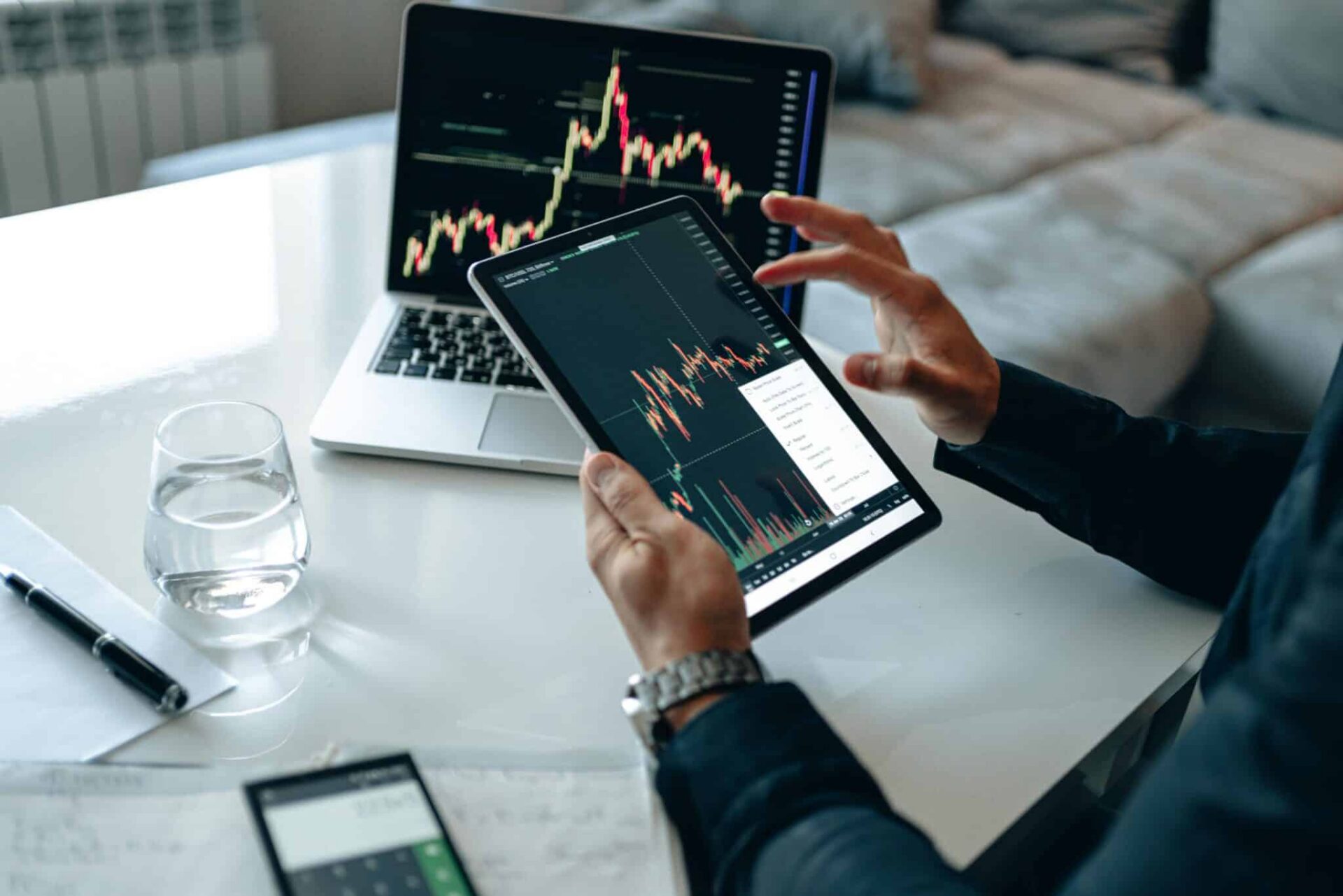 Image of stock analysis on tablet in EM Law blog about Joint Ventures