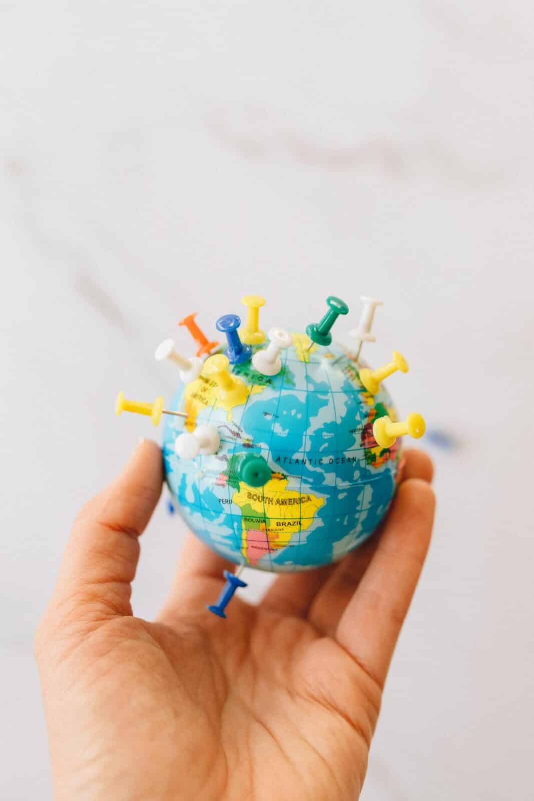 Globe with pins in it in EM Law blog about Consent and Email Tracking Pixels